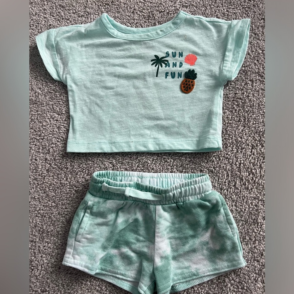 T-shirt designed with a fun slogan & tie died shorts.
